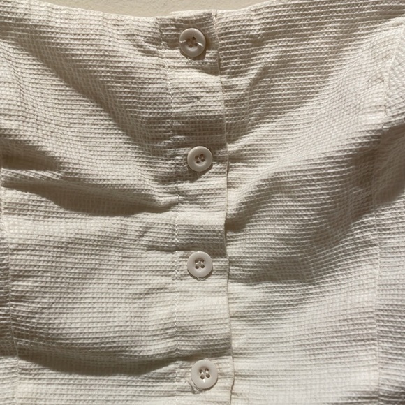 White Crop Top with Button-up Front and Ruffled Sleeve Caps - Picture 2 of 9